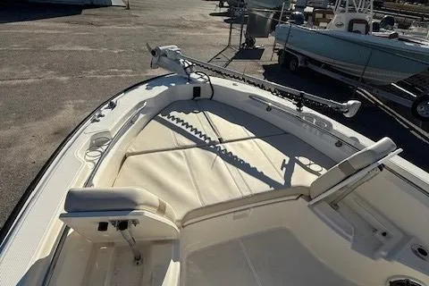 Slide: The Image of 2023 Boston Whaler 250 Dauntless boat interior with seating and fishing equipment. - 19