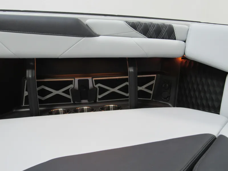 Slide: The Image of Luxurious interior of 2025 Malibu M230 boat with sleek seating and modern design elements. - 15