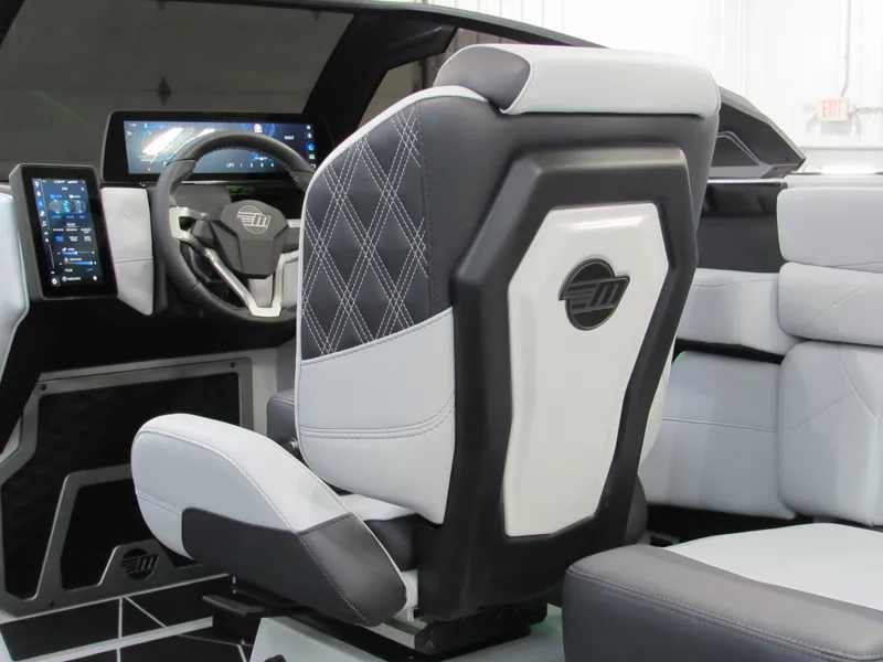 Slide: The Image of 2025 Malibu M230 interior with modern dashboard, touchscreen, and stylish seating. - 9