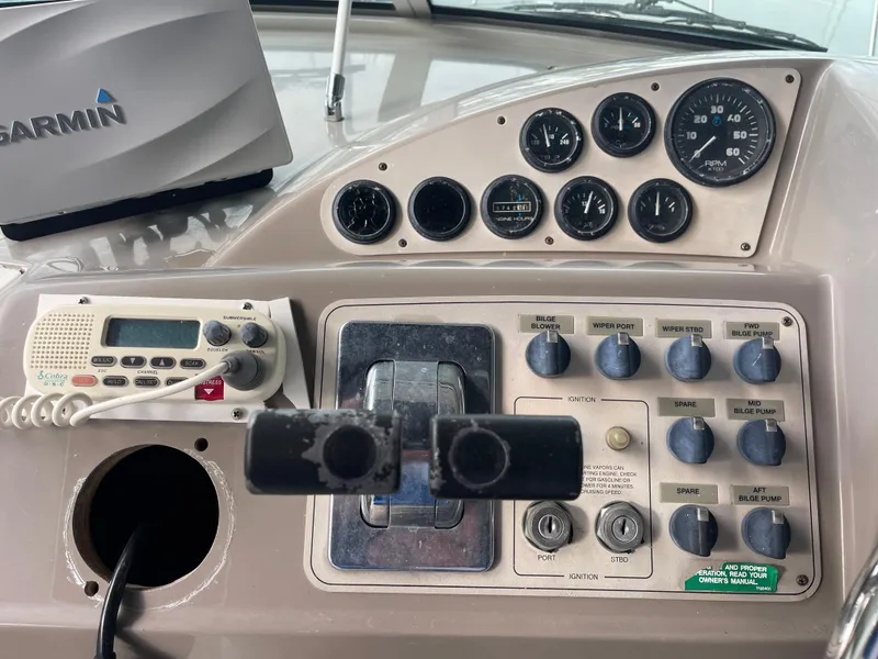 Slide: The Image of Control panel of a 2002 Carver 350 Mariner boat with Garmin navigation system. - 18