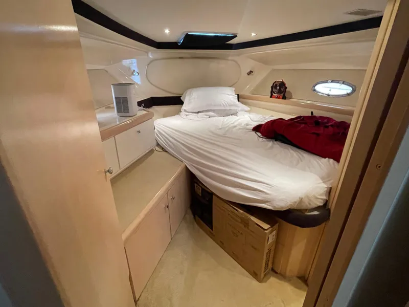 Slide: The Image of Interior cabin of 2002 Carver 350 Mariner yacht with bed and storage. - 30