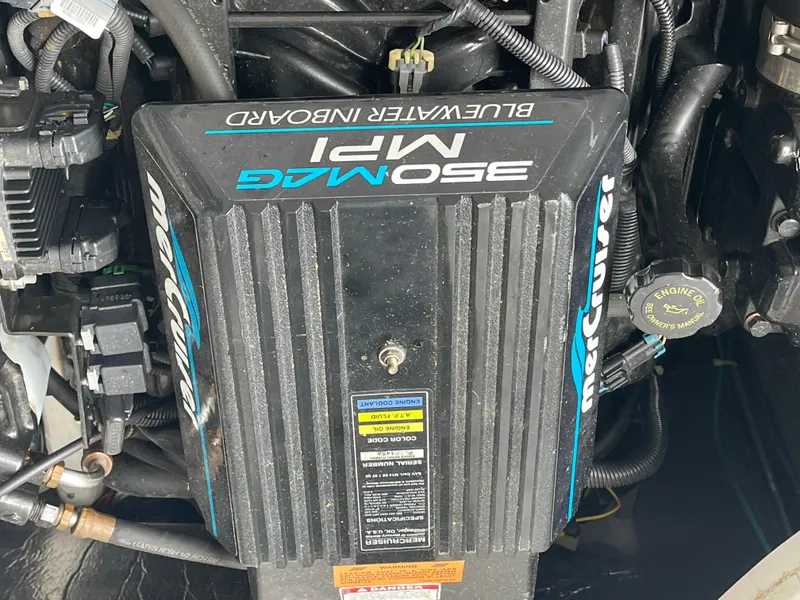 Slide: The Image of Engine of a 2002 Carver 350 Mariner with MerCruiser 350 MAG MPI. - 37