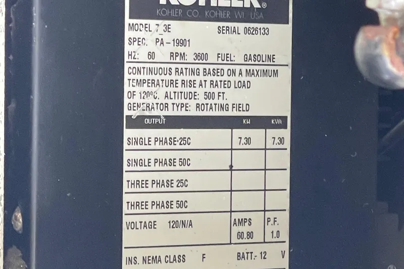 Slide: The Image of Kohler generator label on 2002 Carver 350 Mariner, detailing specifications and ratings. - 43