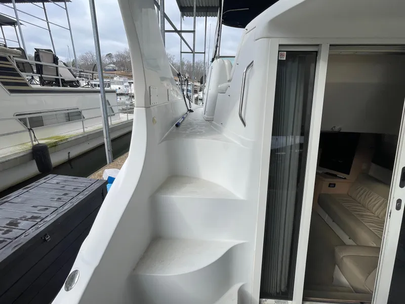 Slide: The Image of 2002 Carver 350 Mariner yacht with white exterior and interior view. - 8