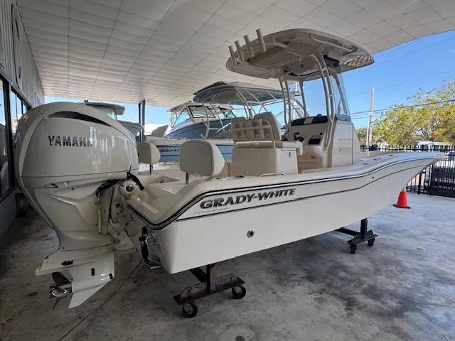 The Image of 2025 Grady-White 231 Coastal Explorer boat with Yamaha engine in showroom. - 1