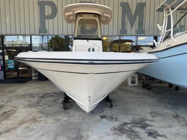 Slide: The Image of 2025 Grady-White 231 Coastal Explorer boat displayed in showroom. - 4