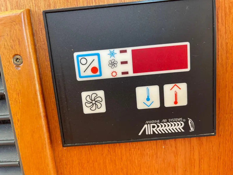 Slide: The Image of Control panel of a 2005 Nordic Tug 37, featuring Marine Air Systems interface. - 25