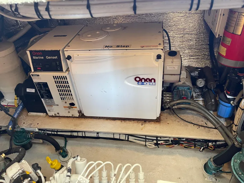Slide: The Image of Engine room of a 2005 Nordic Tug 37 with Onan marine generator. - 28