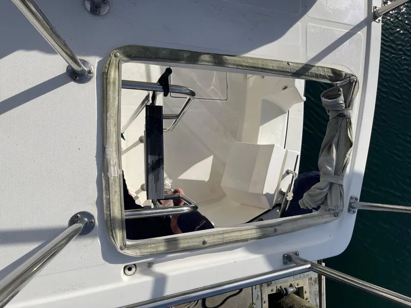 Slide: The Image of Hatch view on 2005 Nordic Tug 37 boat, showing interior and railing details. - 6