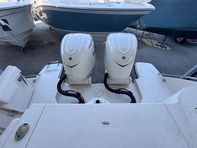 Slide: The Image of 2025 Grady-White Canyon 326 boat with dual outboard engines. - 10