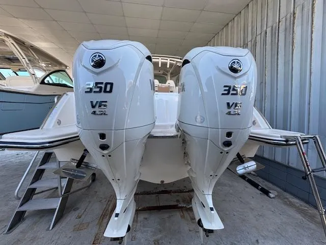 Slide: The Image of 2025 Grady-White Canyon 326 with twin 350 V6 outboard engines. - 8