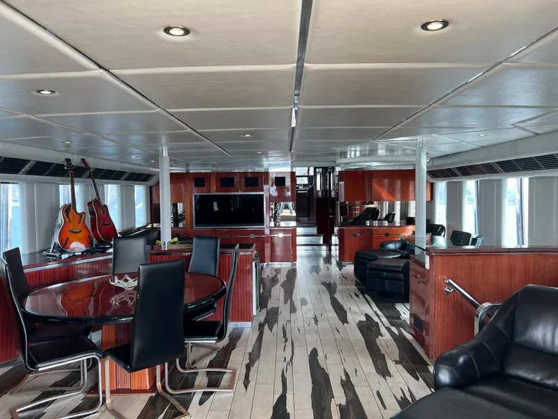 Slide: The Image of Luxurious interior of a 1996 Monte Fino 92 MY yacht with modern furnishings. - 10