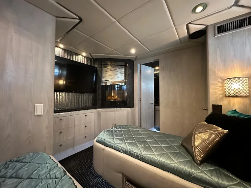 Slide: The Image of Luxurious cabin interior of 1996 Monte Fino 92 MY yacht with twin beds and modern decor. - 35