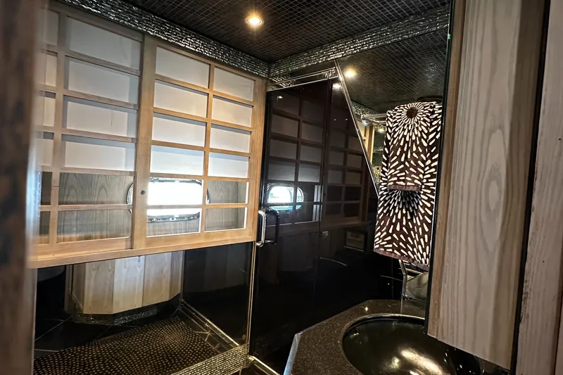 Slide: The Image of Luxurious bathroom interior on 1996 Monte Fino 92 MY yacht with modern design elements. - 36