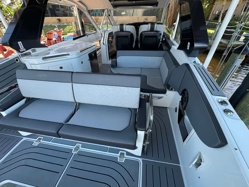 Slide: The Image of 2022 Galeon 325 GTO luxury yacht interior with sleek seating and modern design. - 38