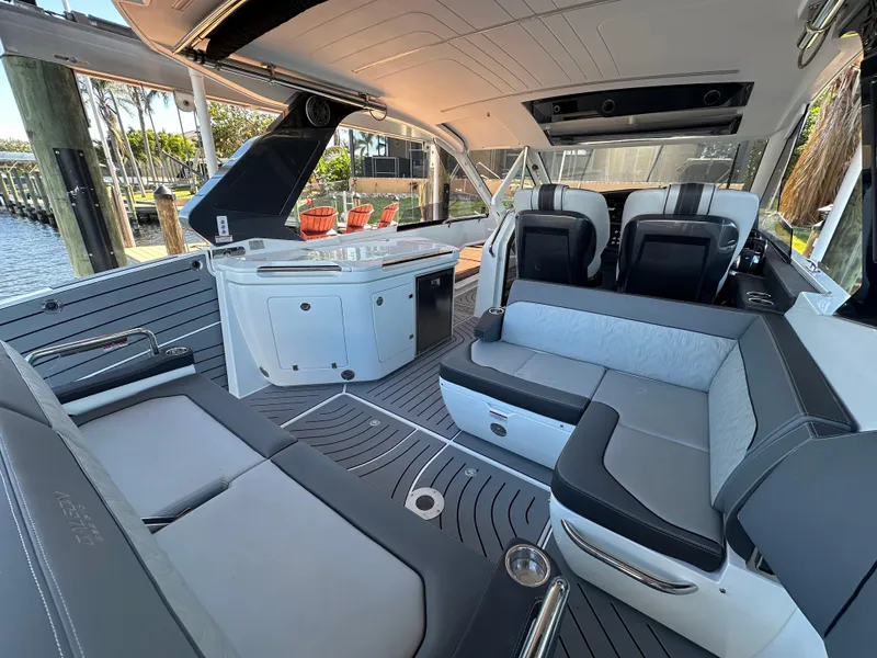 Slide: The Image of 2022 Galeon 325 GTO luxury yacht interior with modern seating and sleek design. - 41