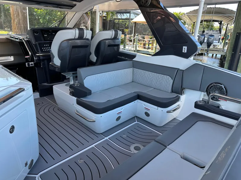 Slide: The Image of 2022 Galeon 325 GTO interior with modern seating and sleek design. - 43