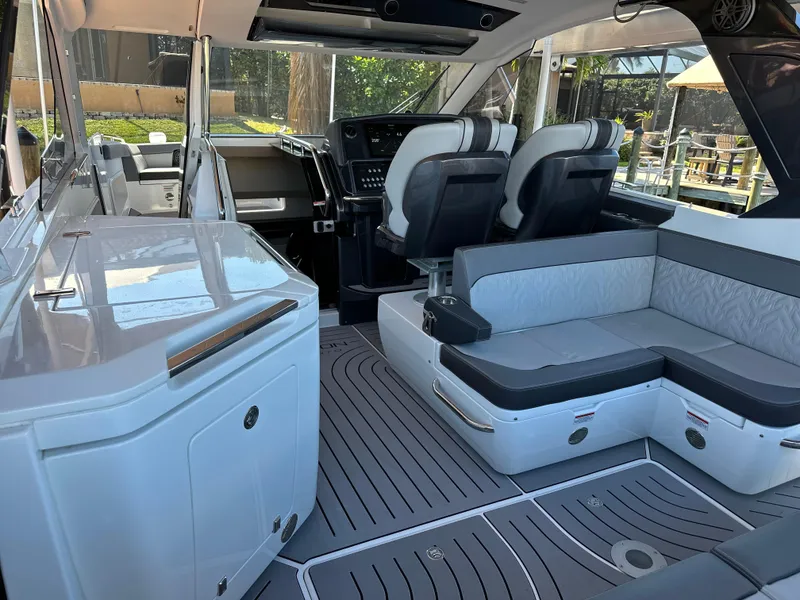 Slide: The Image of Interior of 2022 Galeon 325 GTO yacht with modern seating and sleek design. - 45