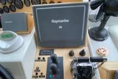 Slide: The Image of Control panel of a 1995 Navigator 50 boat with Raymarine equipment. - 30
