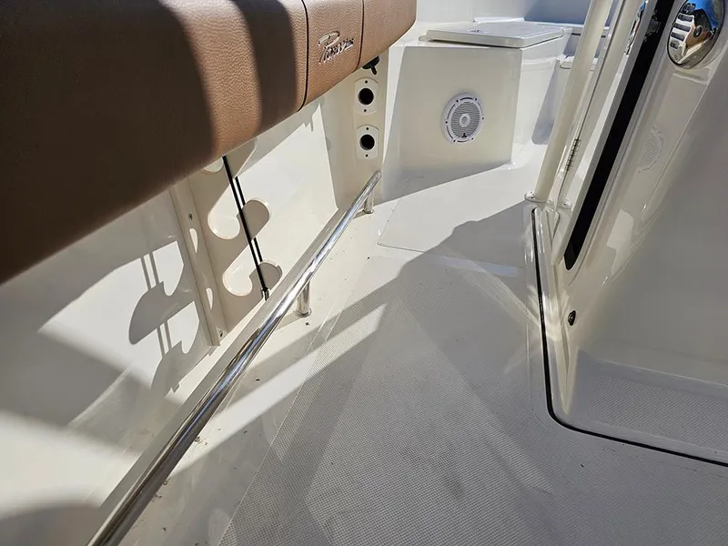 Slide: The Image of 2025 Pioneer 220 Bay Sport boat interior with seating and speaker detail. - 16