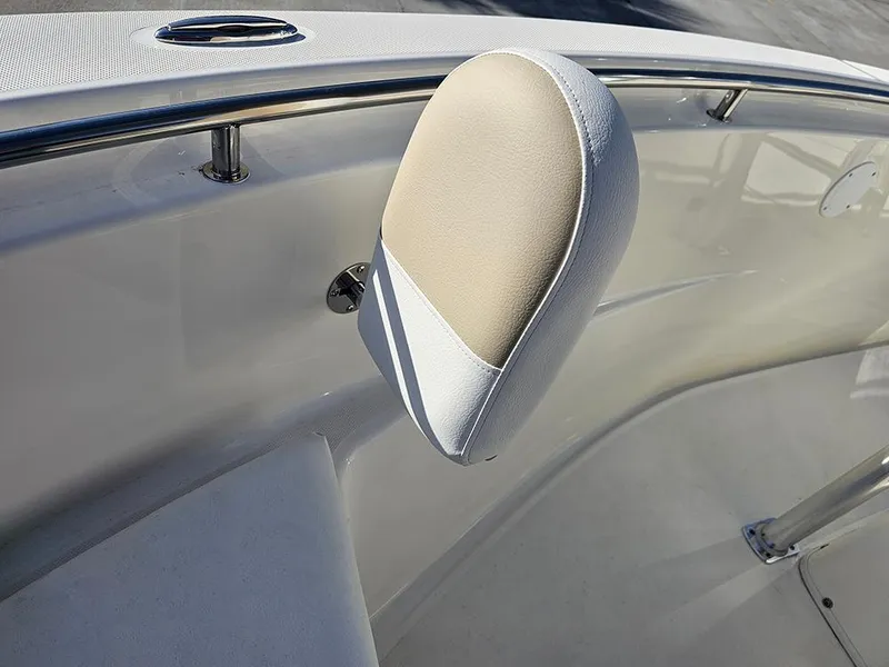 Slide: The Image of 2025 Bulls Bay 230 Center Console boat interior detail with cushioned seating. - 27