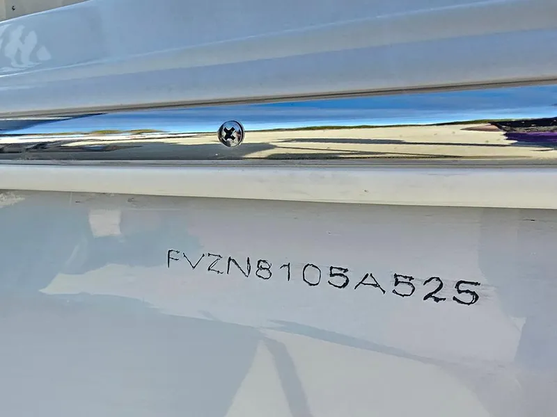 Slide: The Image of 2025 Bulls Bay 230 Center Console boat with visible hull identification number. - 28
