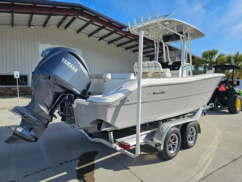 Slide: The Image of 2025 Bulls Bay 230 Center Console boat with Yamaha engine on trailer. - 3