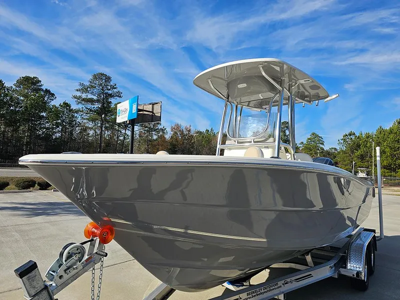 Slide: The Image of 2025 Bulls Bay 230 Center Console boat on trailer under blue sky. - 5