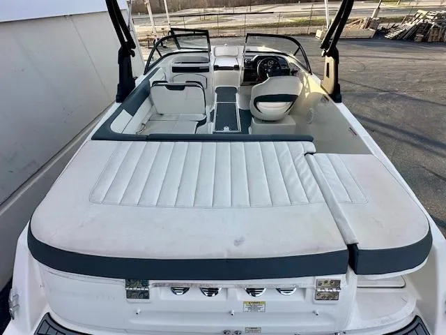 Slide: The Image of 2018 Bayliner VR5 Bowrider I/O boat interior with white seating and dashboard. - 3