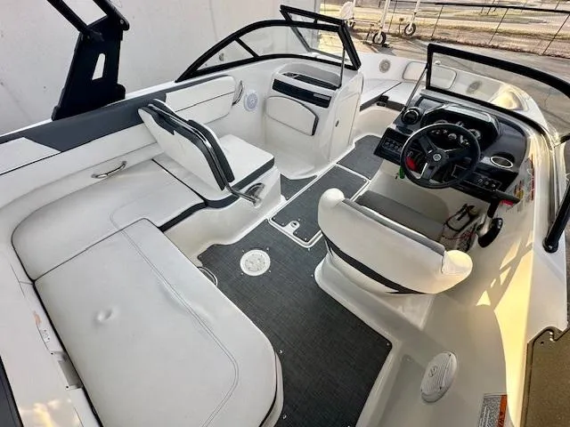 Slide: The Image of 2018 Bayliner VR5 Bowrider I/O interior with seating and steering wheel. - 5