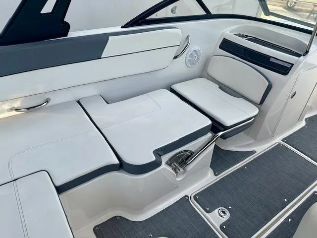 Slide: The Image of 2018 Bayliner VR5 Bowrider I/O interior with white seating and modern design. - 6