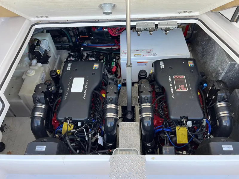 Slide: The Image of 2011 Regal 35 Express Cruiser engine compartment with dual Volvo Penta engines. - 32