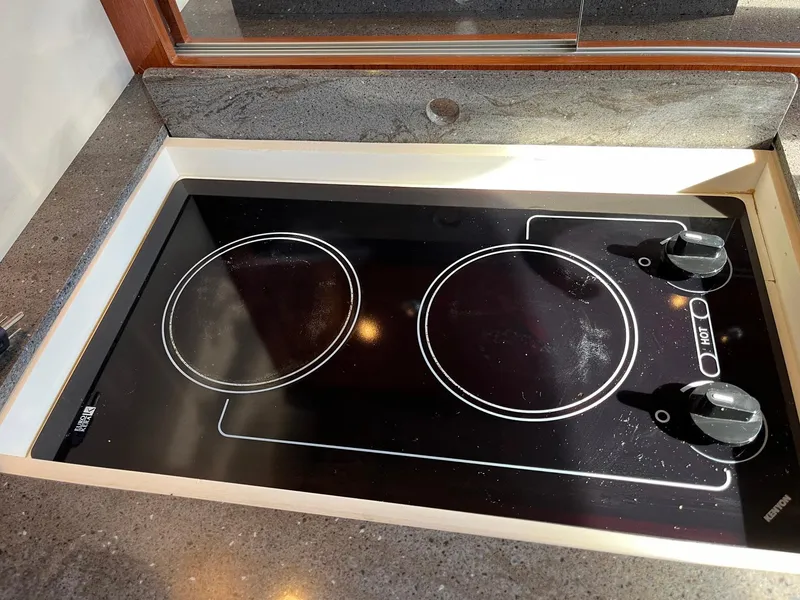Slide: The Image of Ceramic cooktop on 2011 Regal 35 Express Cruiser yacht kitchen. - 5