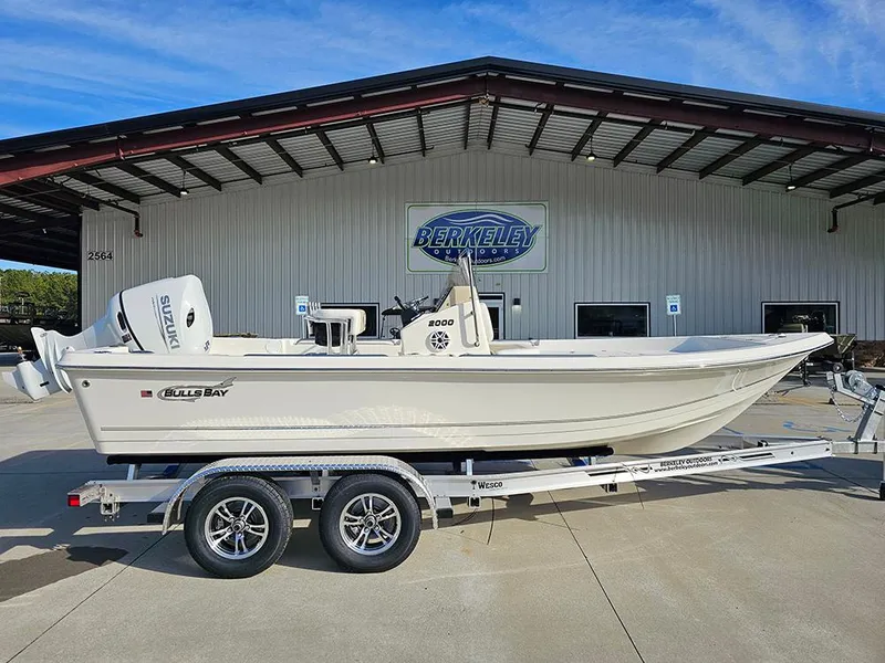 The Image of 2025 Bulls Bay 2000 boat on trailer outside Berkeley building. - 1