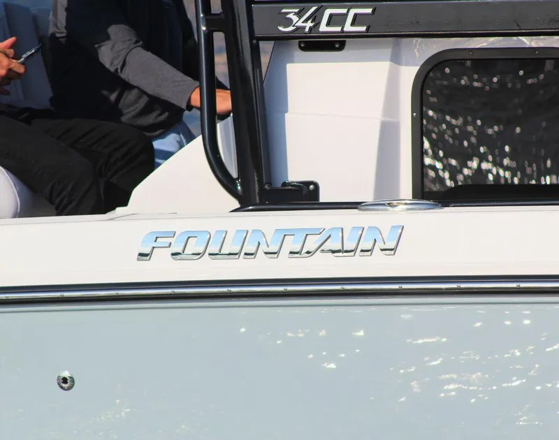 Slide: The Image of 2025 Fountain 34 CC boat side view with logo and model name. - 5