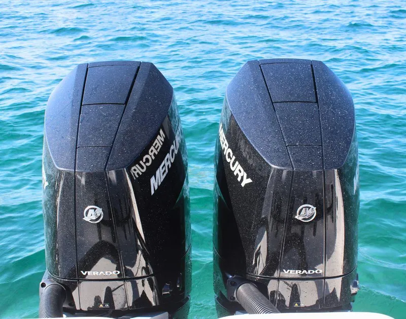 Slide: The Image of Twin Mercury Verado outboard engines on a 2025 Fountain 34 CC boat. - 6