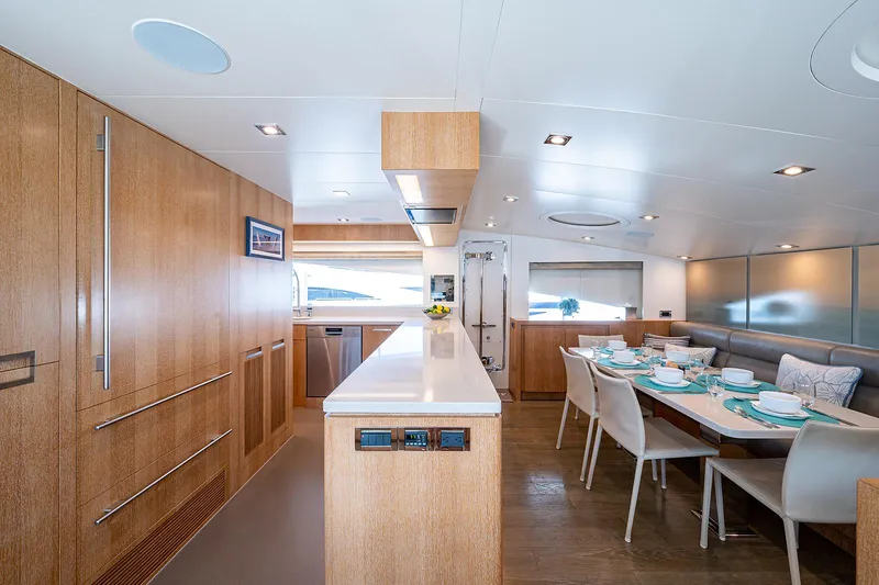 Slide: The Image of Luxurious dining area and kitchen on 2014 Horizon RP 110 yacht. - 10