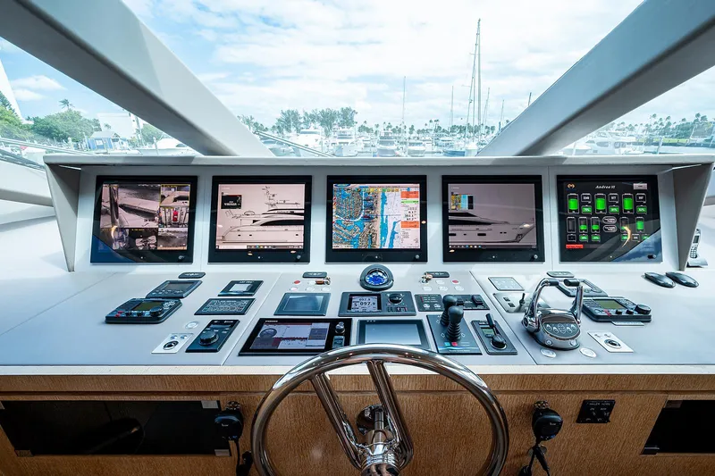 Slide: The Image of Control panel of 2014 Horizon RP 110 yacht with multiple screens and navigation equipment. - 30
