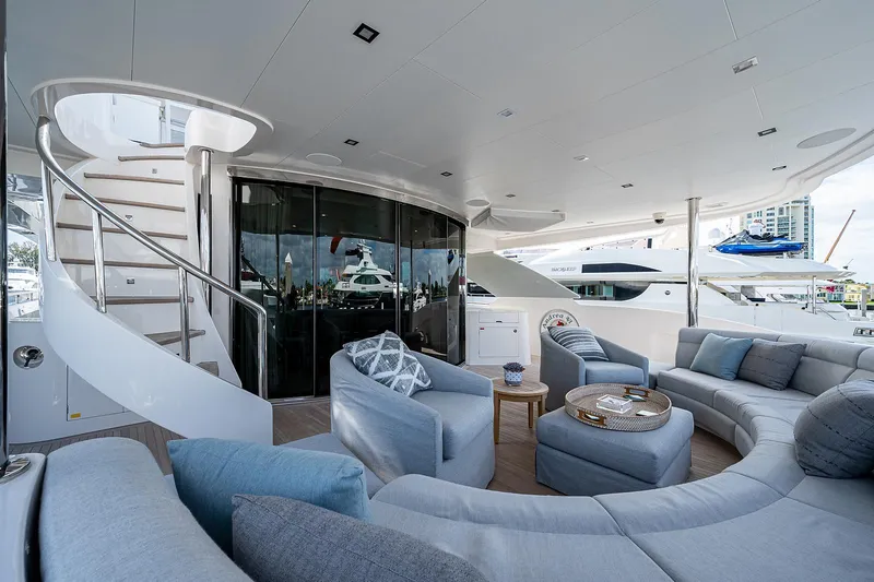 Slide: The Image of Luxurious Horizon RP 110 yacht interior with plush seating, spiral staircase, and modern design, 2014 model. - 47