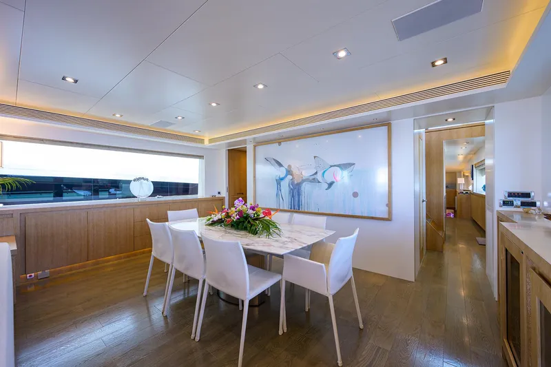 Slide: The Image of Luxurious dining area on 2014 Horizon RP 110 yacht with modern decor and elegant furnishings. - 6
