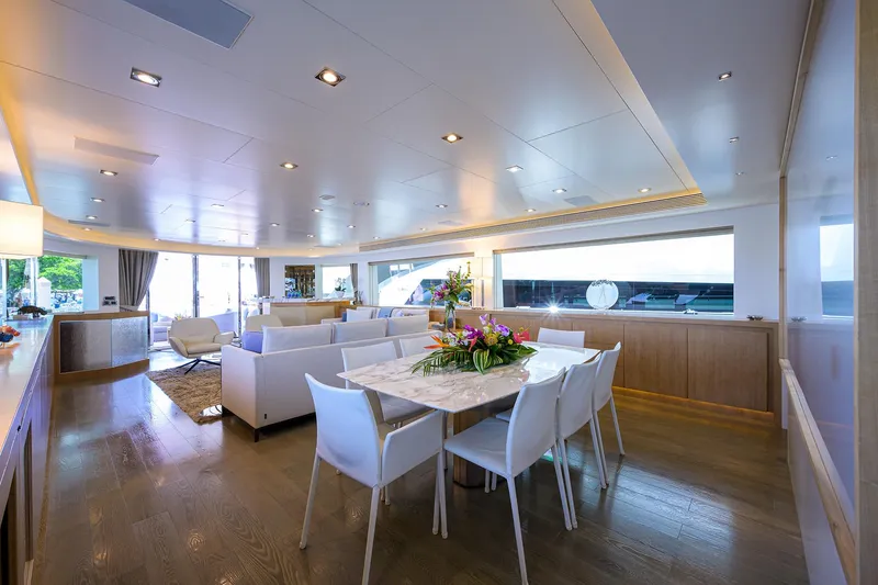 Slide: The Image of Luxurious interior of 2014 Horizon RP 110 yacht with modern dining area and elegant decor. - 8