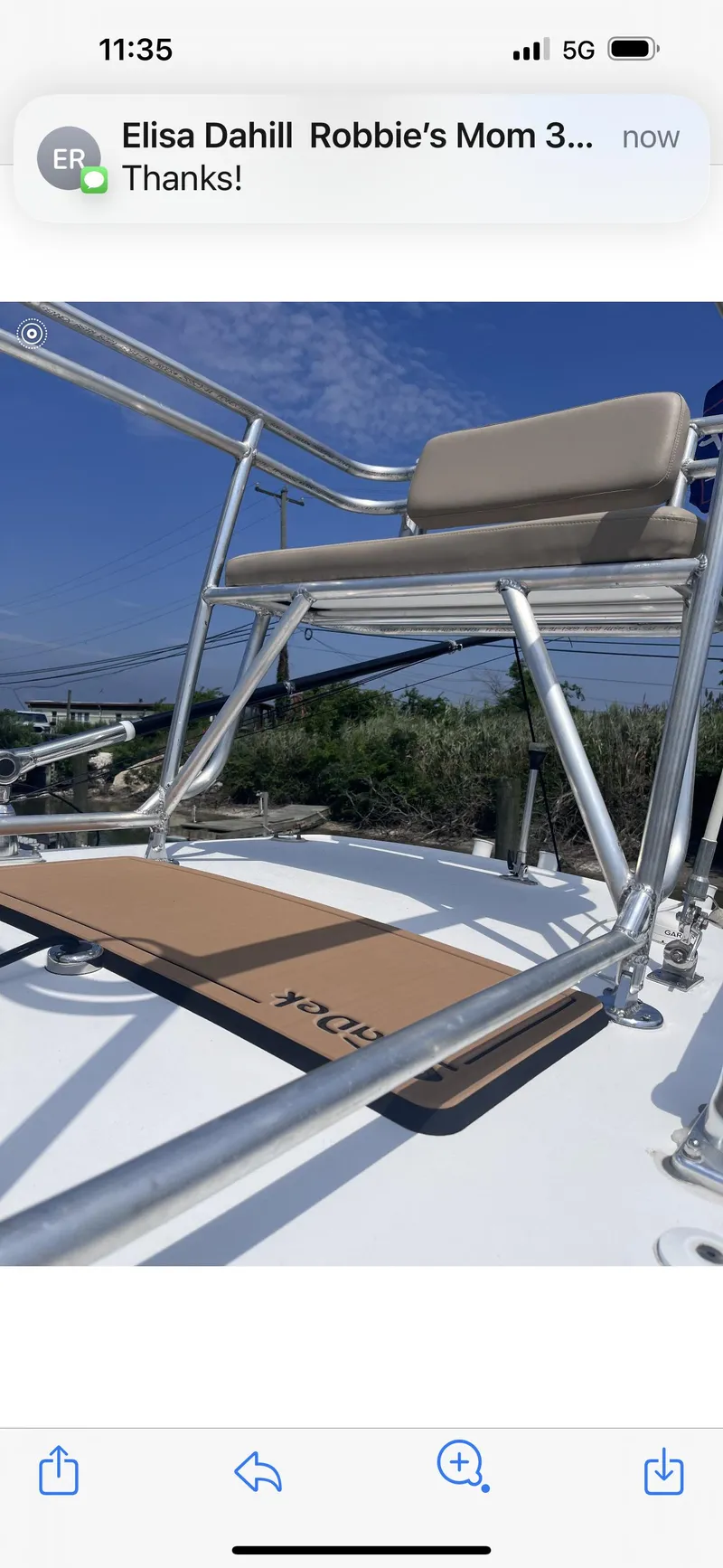 Slide: The Image of 2019 Sportsman Masters 247 Bay Boat with seating and railing, under clear blue sky. - 10