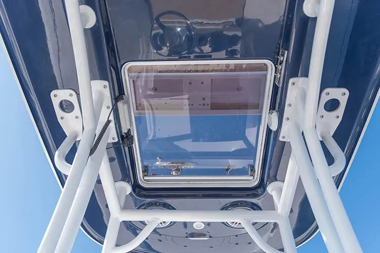 Slide: The Image of 2019 Sportsman Masters 247 Bay Boat, view of T-top and console from below. - 19