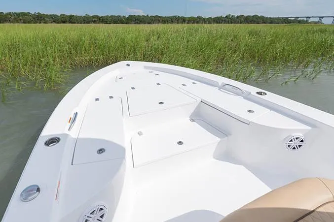 Slide: The Image of 2019 Sportsman Masters 247 Bay Boat on calm water near marshland. - 7