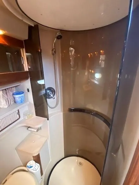 Slide: The Image of Bathroom interior of 1992 Regal 40 Commodore yacht with shower and sink. - 21