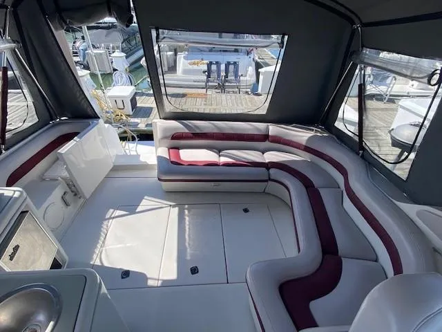 Slide: The Image of Interior of 1992 Regal 40 Commodore yacht with spacious seating and modern amenities. - 9