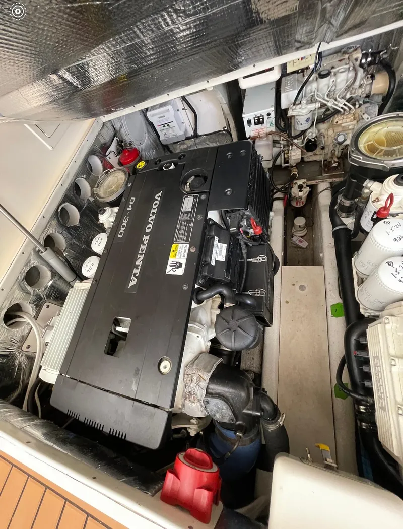 Slide: The Image of Engine compartment of a 2006 Carolina Classic 28 Express with Volvo Penta D4-300 engine. - 20