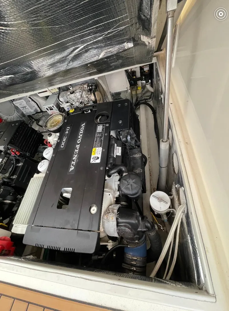 Slide: The Image of Engine compartment of a 2006 Carolina Classic 28 Express with Volvo Penta D4-300 engine. - 23