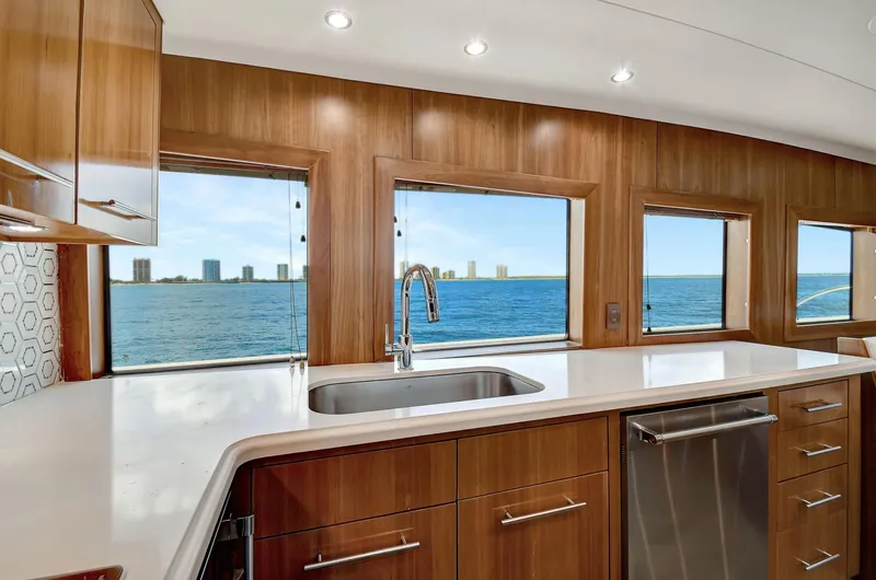 Slide: The Image of Luxurious kitchen interior of 2005 Hatteras Semi-Displacement yacht with ocean view. - 14