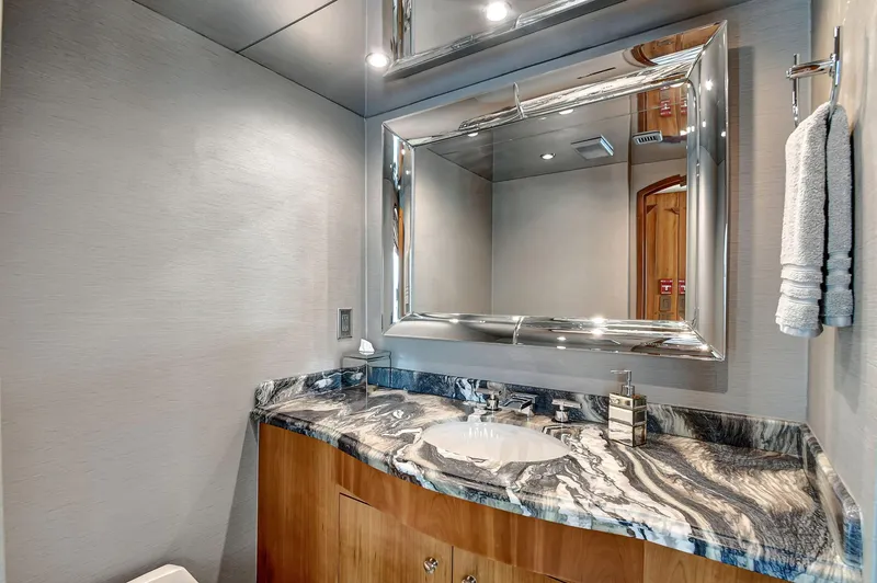 Slide: The Image of Luxurious bathroom on 2005 Hatteras Semi-Displacement yacht with elegant marble countertop. - 16